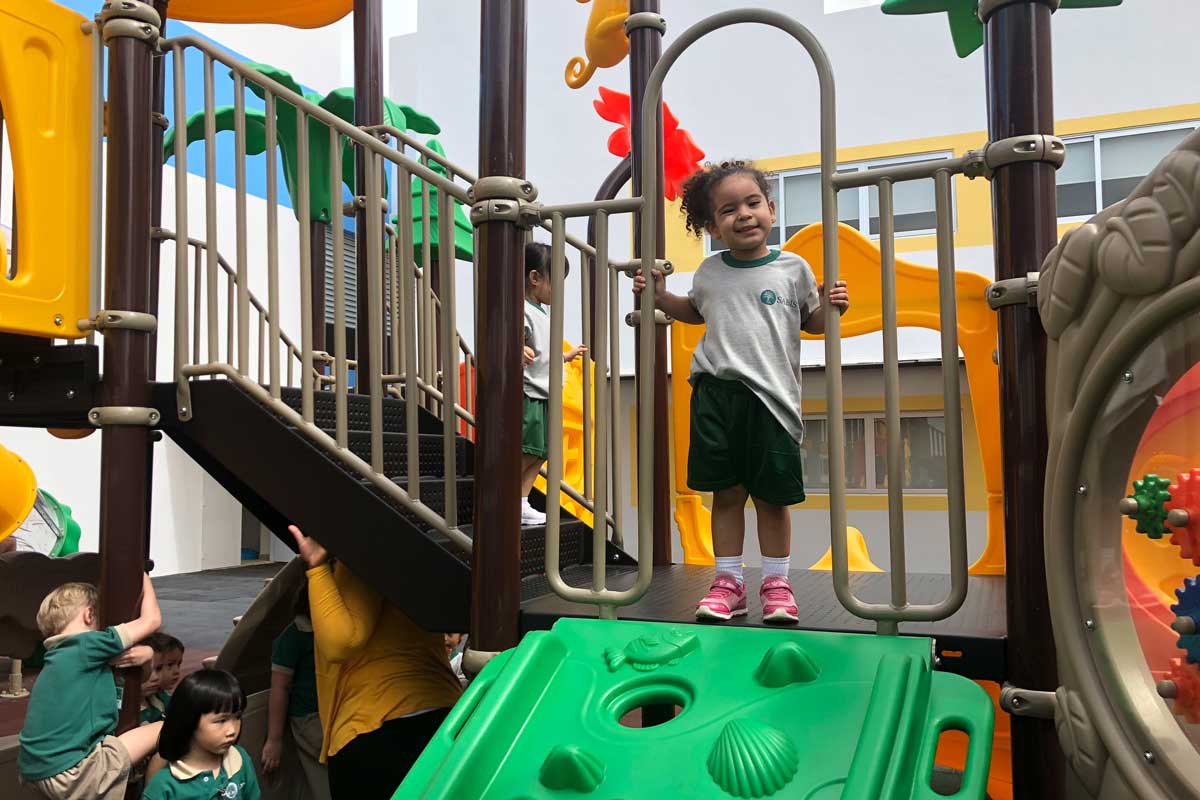 Girl playing in playground